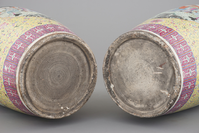 A massive pair of Chinese famille jaune and rose vases with elephants, early 19th C.