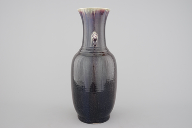 A tall Chinese porcelain flambe glaze vase with elephant handles, 19/20th C.