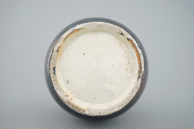 A tall Chinese porcelain flambe glaze vase with elephant handles, 19/20th C.
