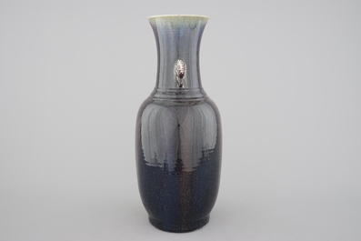 A tall Chinese porcelain flambe glaze vase with elephant handles, 19/20th C.