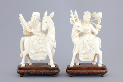 Two carved ivory figures of Chinese immortals on deers, ca. 1920
