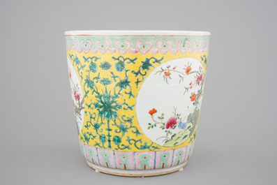 A tall Chinese famille rose yellow ground jardiniere, 19th C.