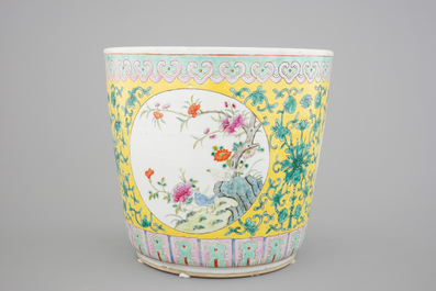 A tall Chinese famille rose yellow ground jardiniere, 19th C.