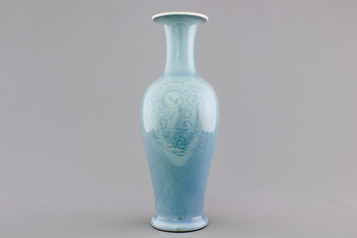 A Chinese porcelain monochrome underglaze decorated vase, 19/20th C.