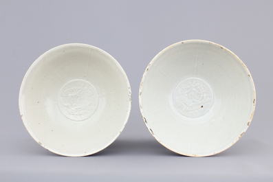 A pair of Chinese Qingbai bowls with fish, Song, 10-13th C.