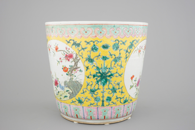 A tall Chinese famille rose yellow ground jardiniere, 19th C.