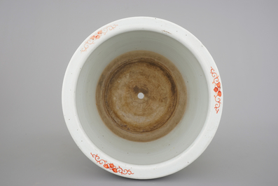 A tall Chinese famille rose yellow ground jardiniere, 19th C.