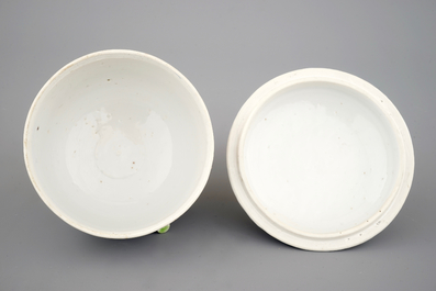 A Chinese famille rose and relief box and cover and two saucers with fish, Yongzheng, 1722-1735