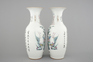 A tall pair of Chinese famille rose vases with beauties in a garden, 19th C.