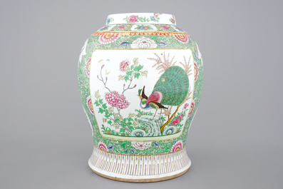 A Chinese famille rose porcelain vase with a peacock, 19th C.
