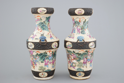 A pair of Chinese Nanking famille rose vases with warrior scenes, 19th C.