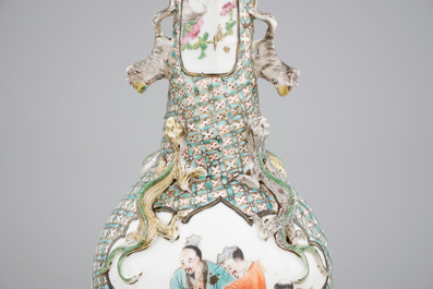 A pair of Canton famille verte vases and a pink ground Canton vase, 19th C.