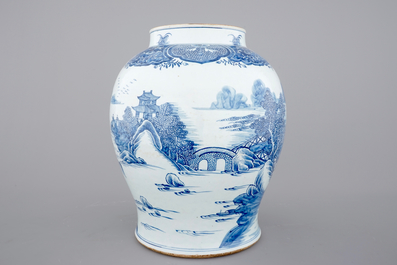 A tall blue and white Chinese porcelain landscape vase, early 18th C.