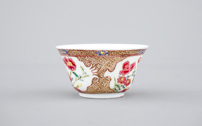 Two Chinese famille rose and gilt porcelain cups and saucers, Yongzheng, 1722-1735