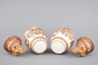 A very tall pair of Japanese Satsuma vases and covers, 19th C.