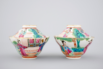 A pair of Chinese Canton famille rose cups, saucers and covers, Daoguang, 19th C.