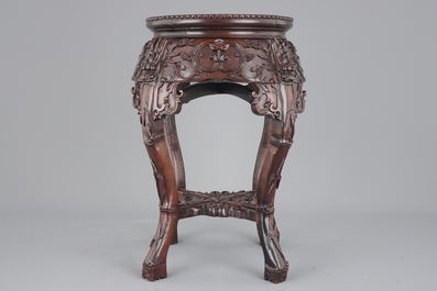 A finely carved Chinese hardwood marble top vase stand, 19th C.