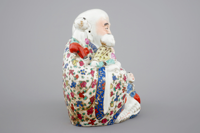 A Chinese famille rose Buddha Hotei with children, 19/20th C.