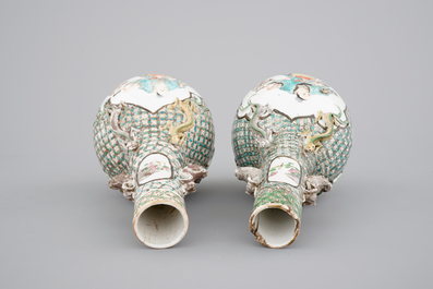 A pair of Canton famille verte vases and a pink ground Canton vase, 19th C.