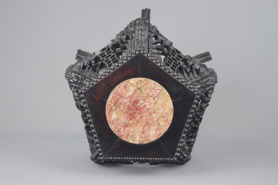 An intricately carved Chinese hardwood marble top vase stand, 19th C.