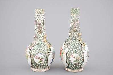 A pair of Canton famille verte vases and a pink ground Canton vase, 19th C.