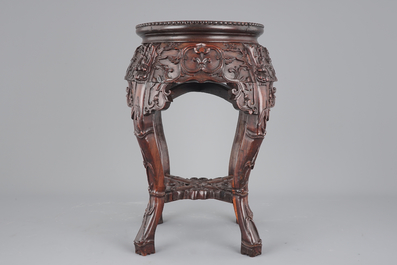 A finely carved Chinese hardwood marble top vase stand, 19th C.