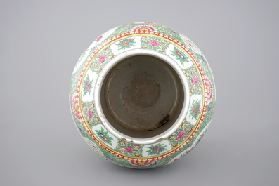 A Chinese famille rose porcelain vase with a peacock, 19th C.