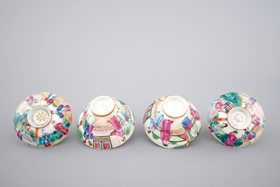 A pair of Chinese Canton famille rose cups, saucers and covers, Daoguang, 19th C.