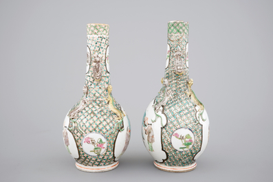 A pair of Canton famille verte vases and a pink ground Canton vase, 19th C.