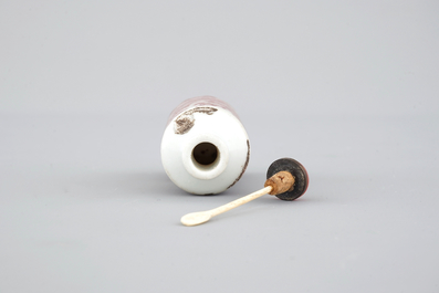 A Chinese blue, white and iron red dragon snuff bottle, ca. 1900