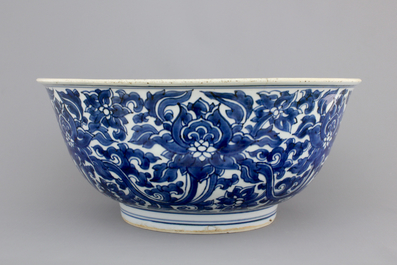 A large blue and white Chinese porcelain bowl with lotus scrolls, Kangxi, ca. 1680