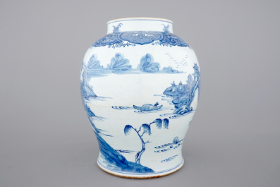 A tall blue and white Chinese porcelain landscape vase, early 18th C.