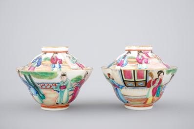 A pair of Chinese Canton famille rose cups, saucers and covers, Daoguang, 19th C.