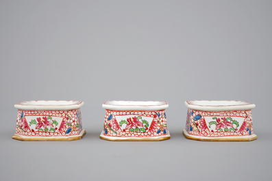 Three Chinese porcelain famille rose salts and five small plates, 18th C.