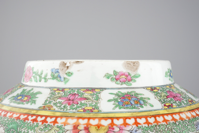 A Chinese famille rose porcelain vase with a peacock, 19th C.