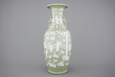 A tall Chinese porcelain white slip on celadon ground vase, 19/20th C.
