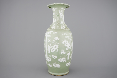 A tall Chinese porcelain white slip on celadon ground vase, 19/20th C.