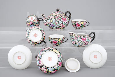 A Chinese black ground and famille rose tea service, ca. 1900, marked Qianlong