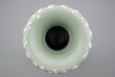 A tall Chinese porcelain white slip on celadon ground vase, 19/20th C.