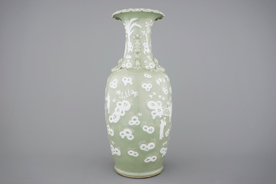 A tall Chinese porcelain white slip on celadon ground vase, 19/20th C.