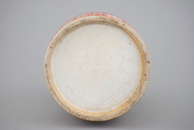 An unusual tall Chinese porcelain coral red ground vase, 19th C.