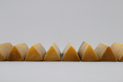 A set of 12 rare polished rhinoceros horn knife rests, ca. 1900