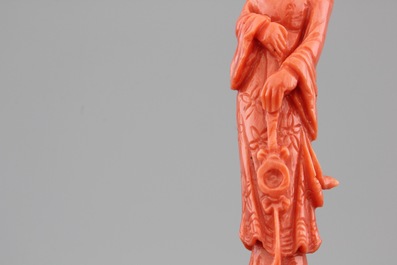 Four Chinese carved red coral figures, 19/20th C.