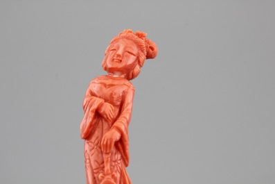 Four Chinese carved red coral figures, 19/20th C.