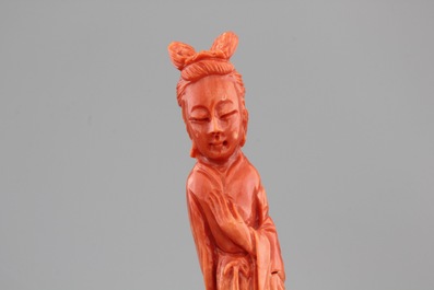 Four Chinese carved red coral figures, 19/20th C.
