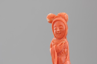Four Chinese carved red coral figures, 19/20th C.