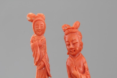 Four Chinese carved red coral figures, 19/20th C.