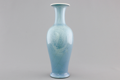 A Chinese porcelain monochrome underglaze decorated vase, 19/20th C.