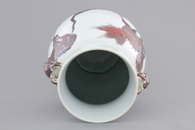 A Chinese hu-shaped deer-handled underglaze red and blue vase with finely painted animals, ca 1900
