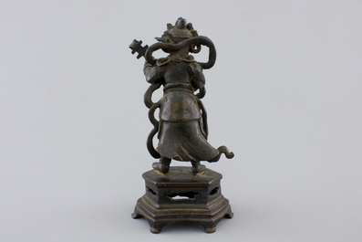 A Chinese bronze sculpture of a musician, Ming Dynasty, 16/17th C.